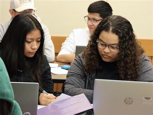 Students collaborate on a project